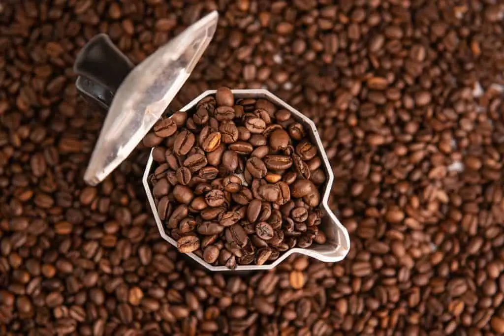 moka pot with coffee beans